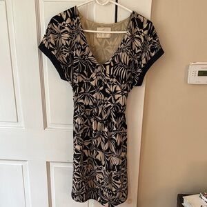 Chic Black and Cream Patterned Mini Dress